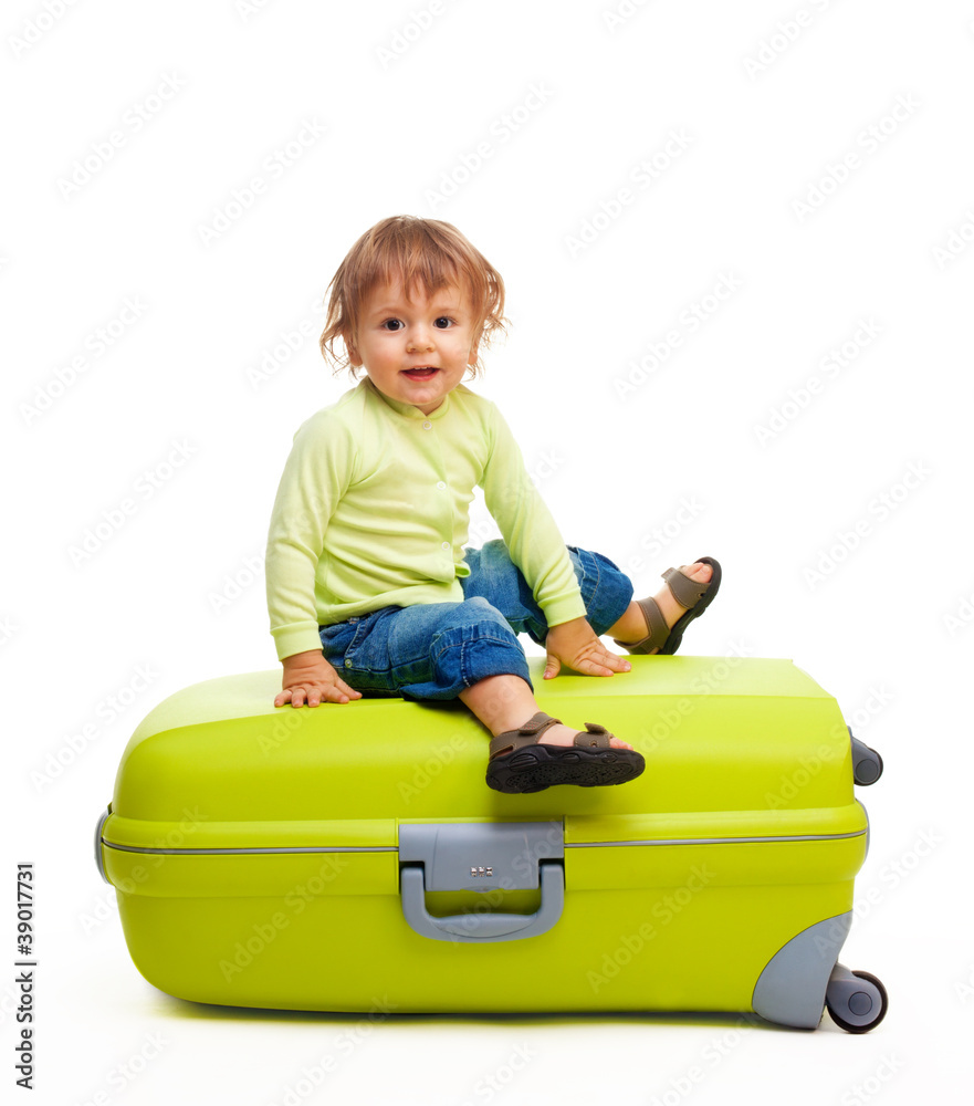 Happy kid with baggage