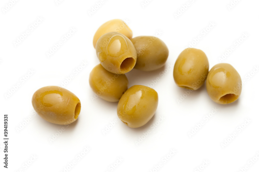 Heap of green seedless olives