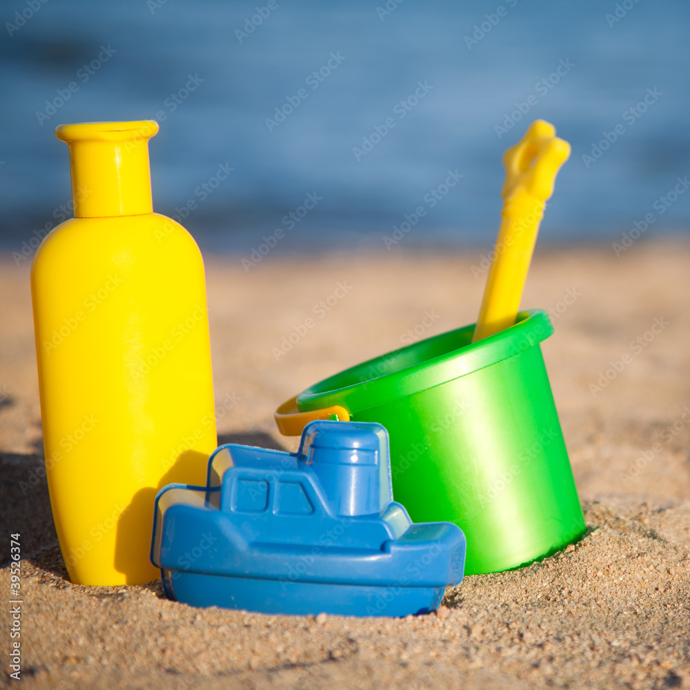 Children`s toys at the beach