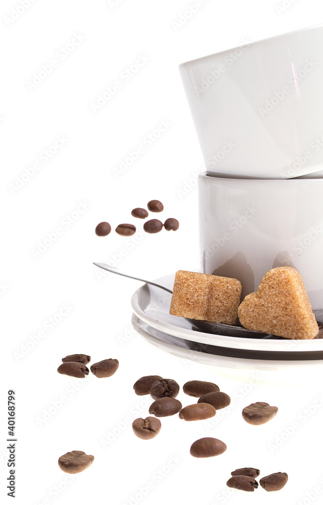 Cup of coffee and sugar isolated on white background.