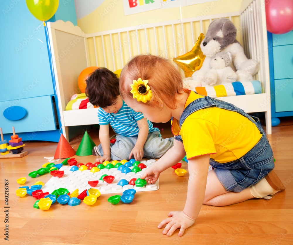 Girls playing with puzzle