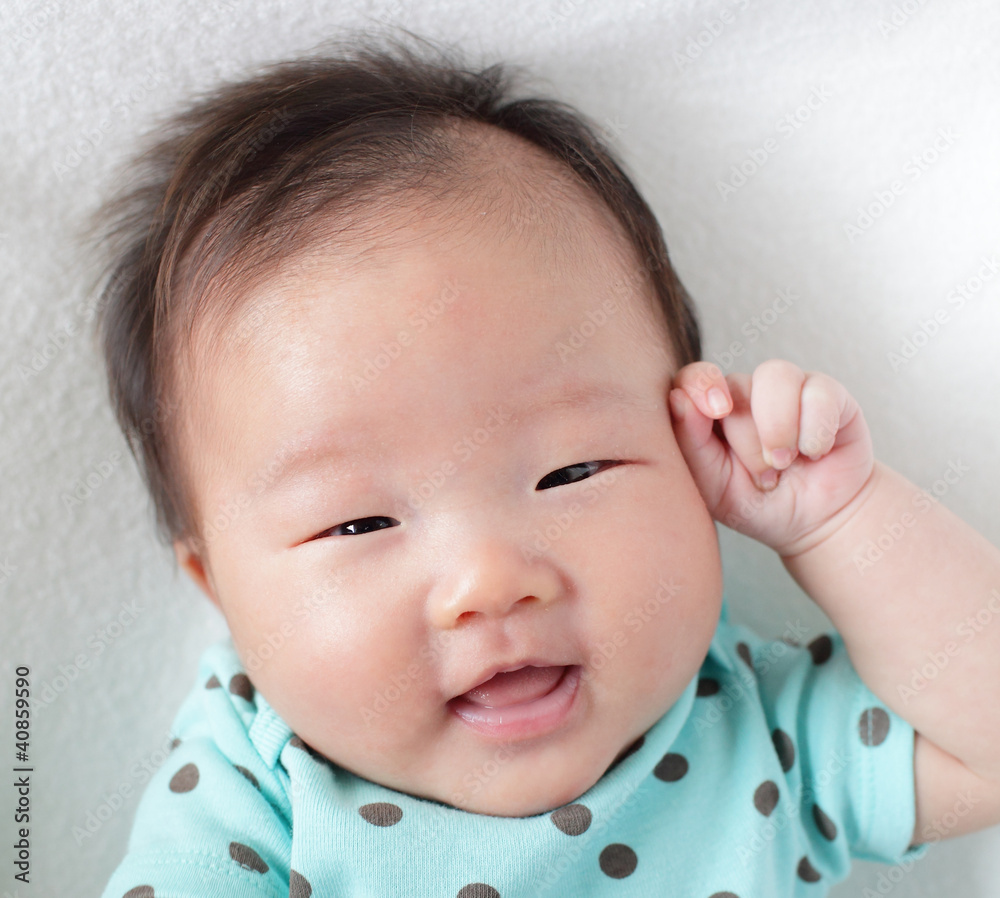 smile face close up of a cute baby