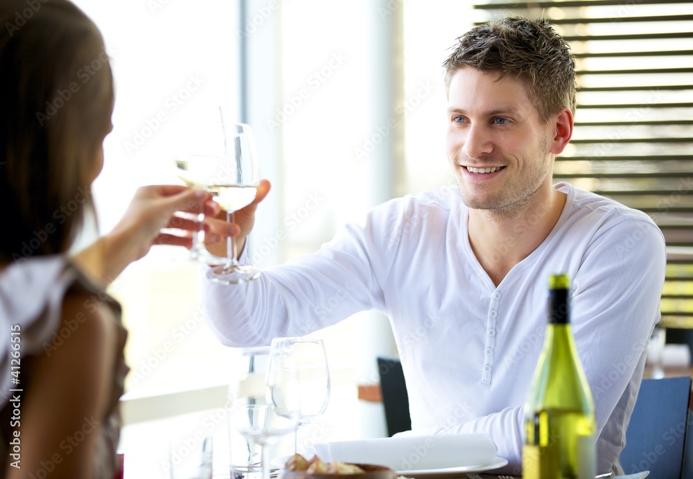 Couple Celebrating Something at a Restaurant