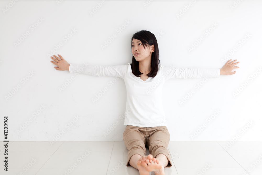 attractive asian woman relaxing in the room