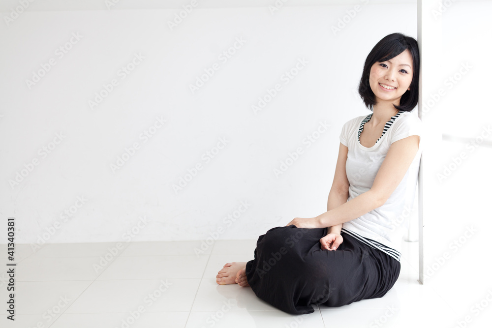 attractive asian woman relaxing in the room