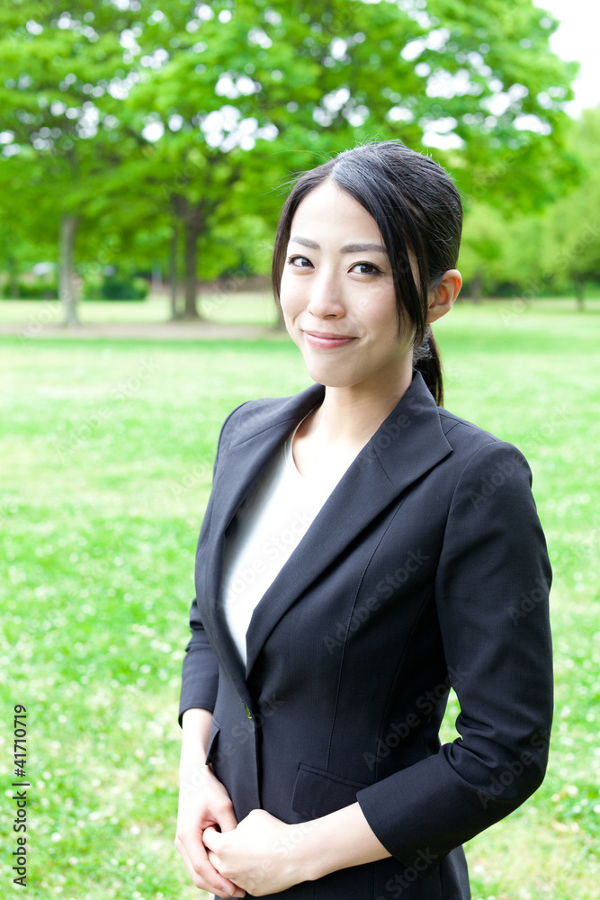 asian businesswoman in the park