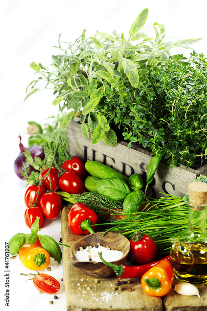 herbs in the box and fresh vegetables