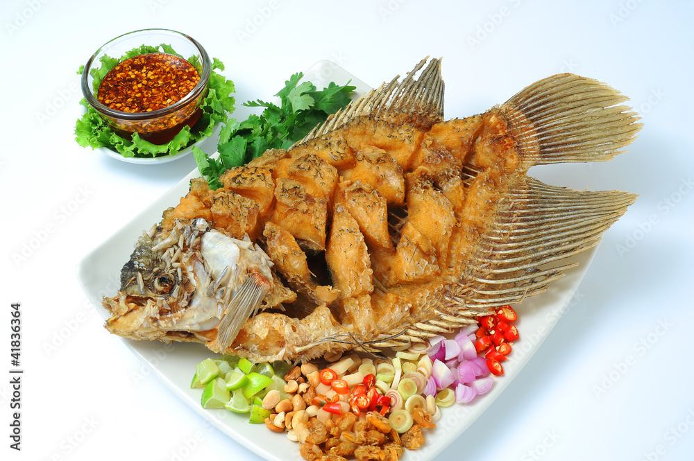 Deep fried fish with herbal sauce