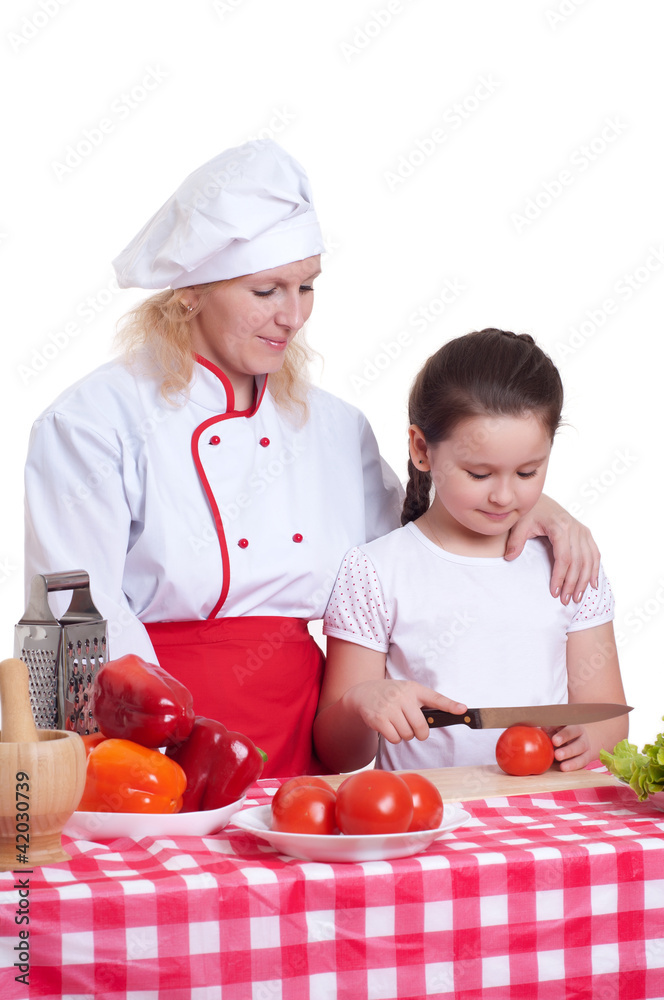 Mother and daughter cooking dinner