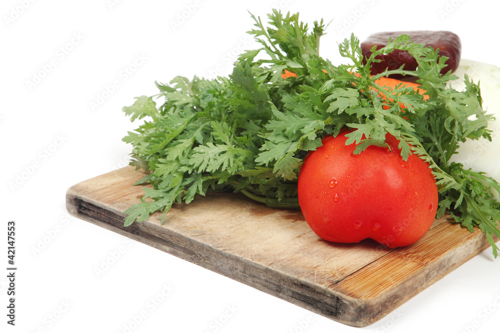 vegetables on hopping block with white background