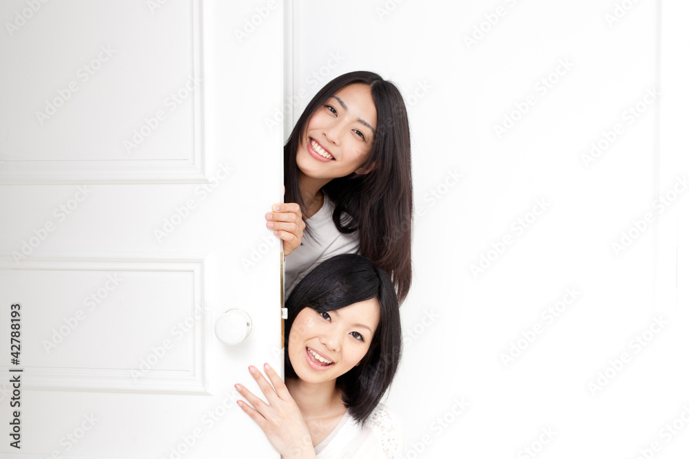 a young asian women with door