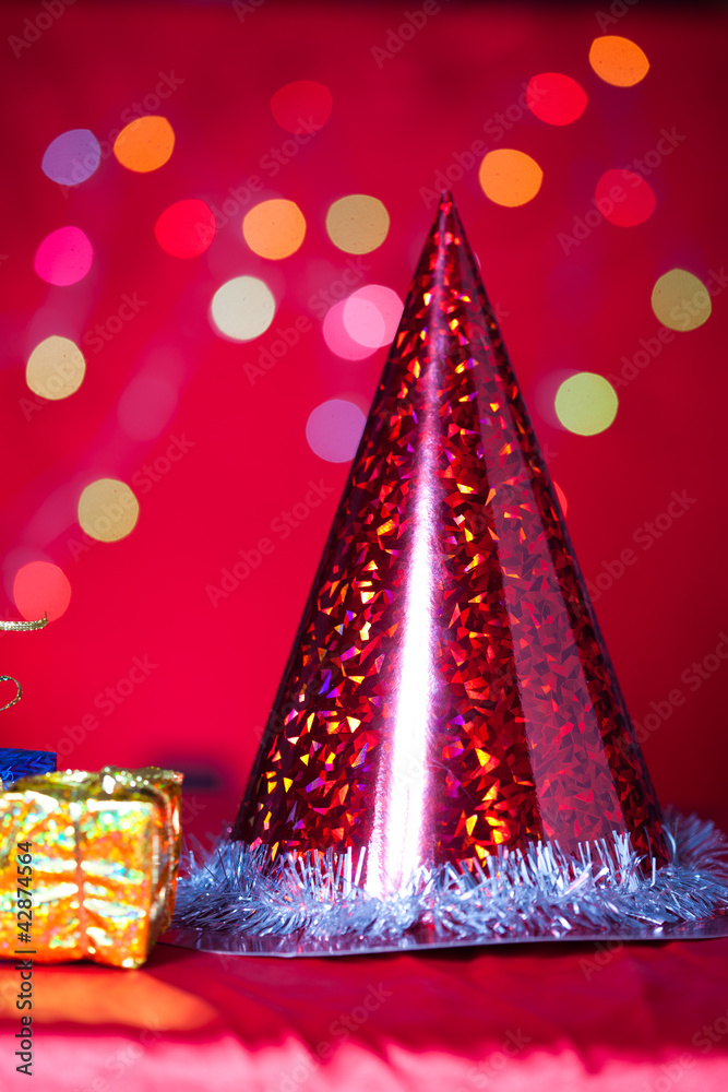 christmas gift and cap with red background