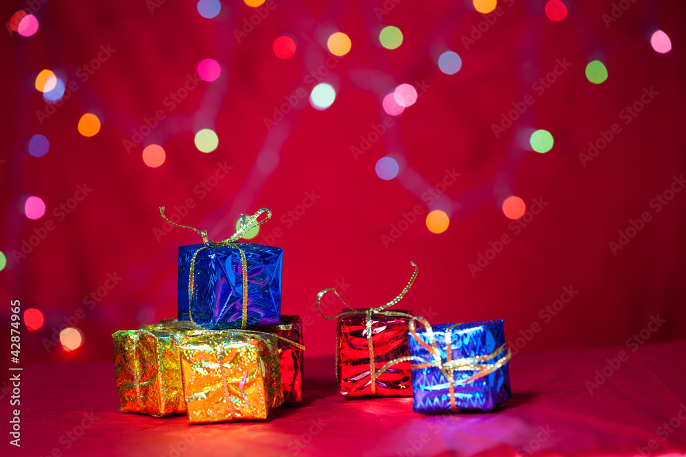 christmas gift and cap with red background