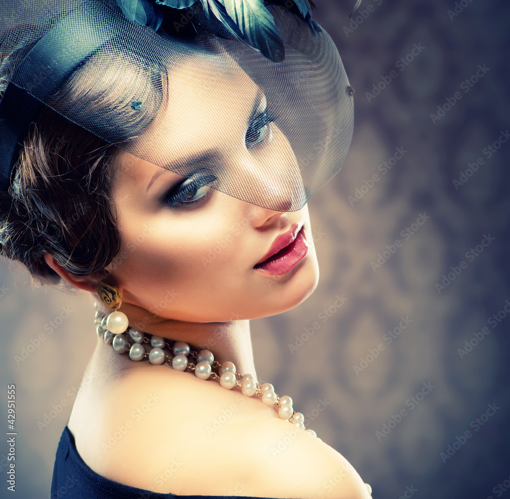 Retro Beauty Portrait. Vintage Styled. Beautiful Young Woman