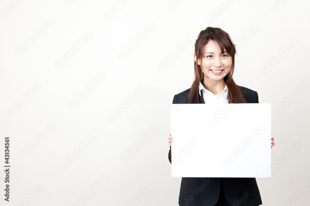 asian businesswoman with blank whiteboard