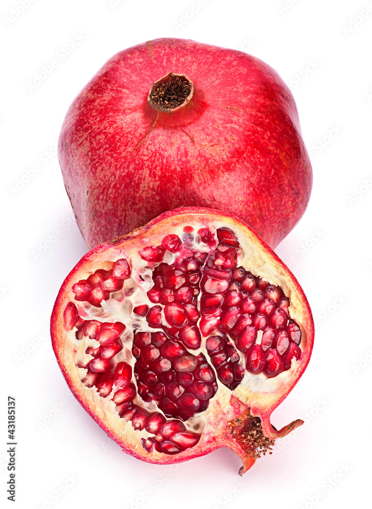 Pomegranate fruit closeup on white background