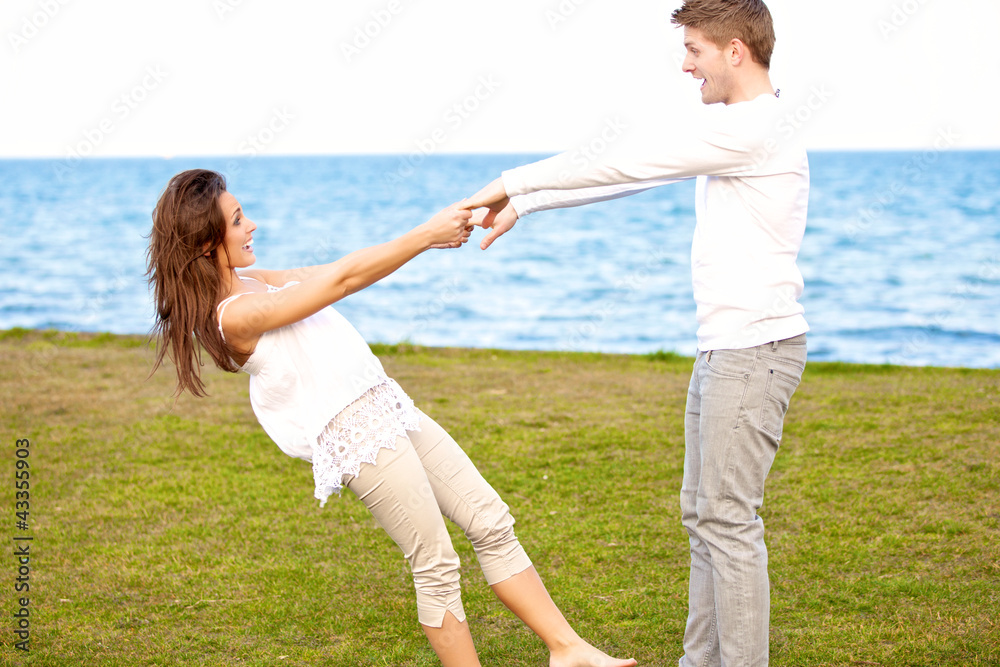 Cute Couple Enjoying Themselves By the Beach