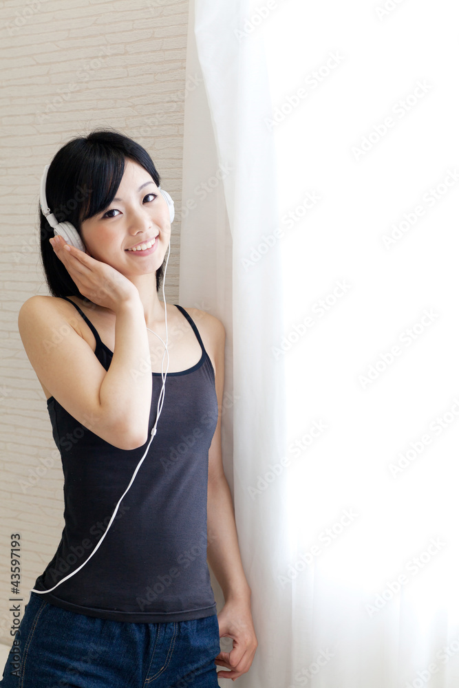 a young asian woman relaxing in morning