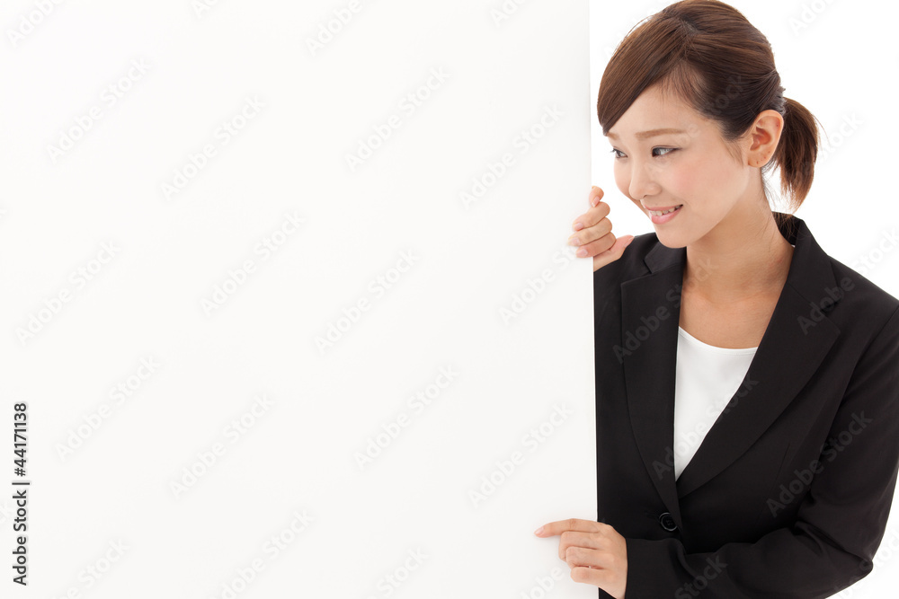 a young businesswoman with blank whiteboard