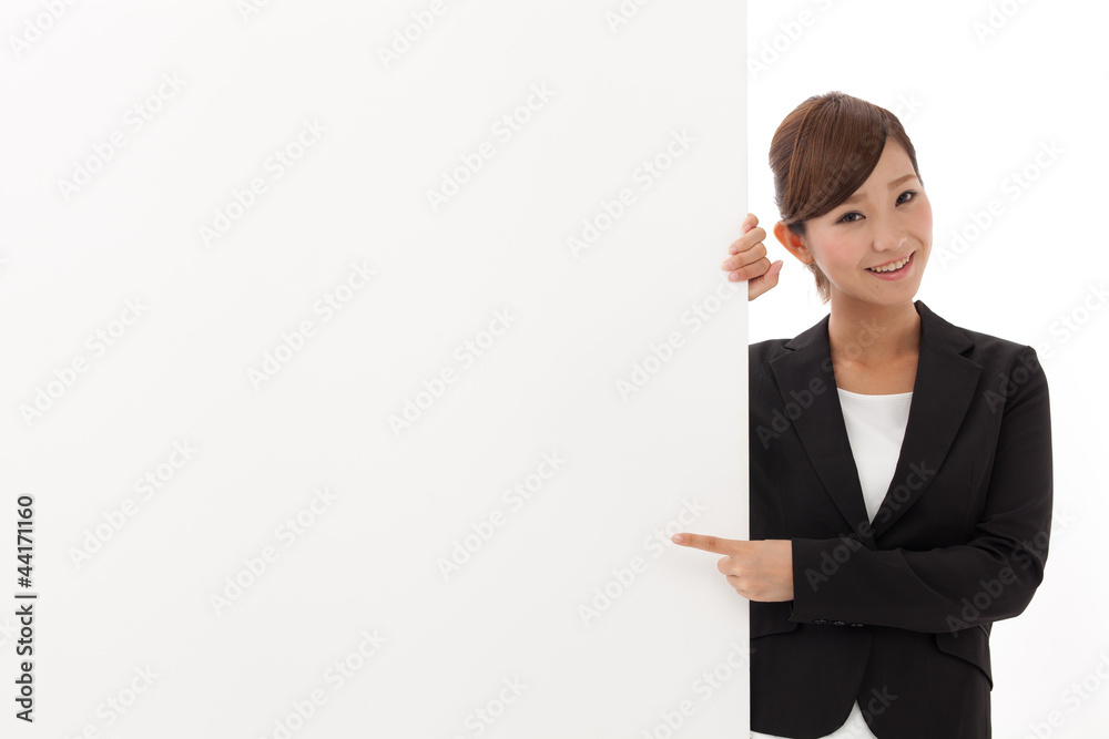 a young businesswoman with blank whiteboard