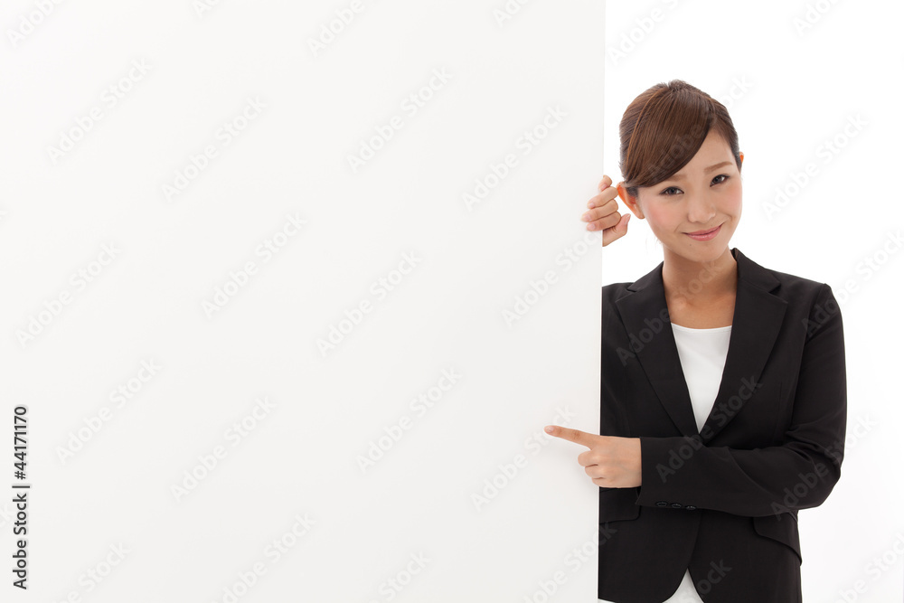 a young businesswoman with blank whiteboard