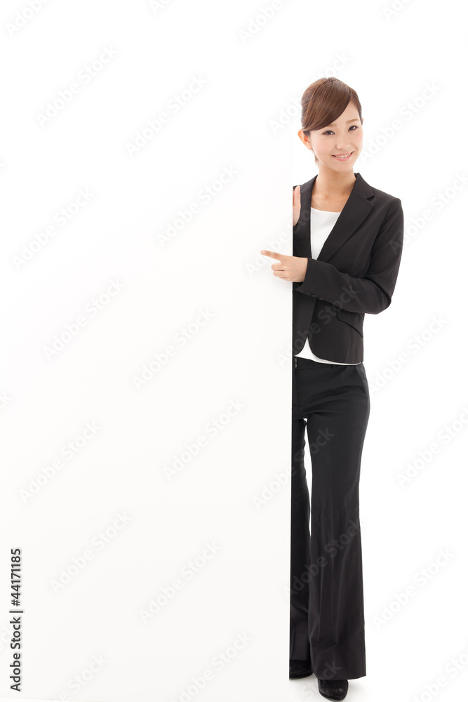 a young businesswoman with blank whiteboard