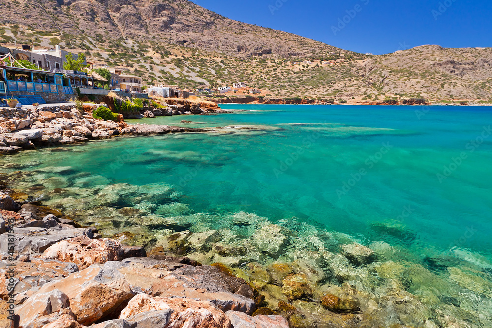 Turquise water of Mirabello bay in Plaka town on Crete, Greece