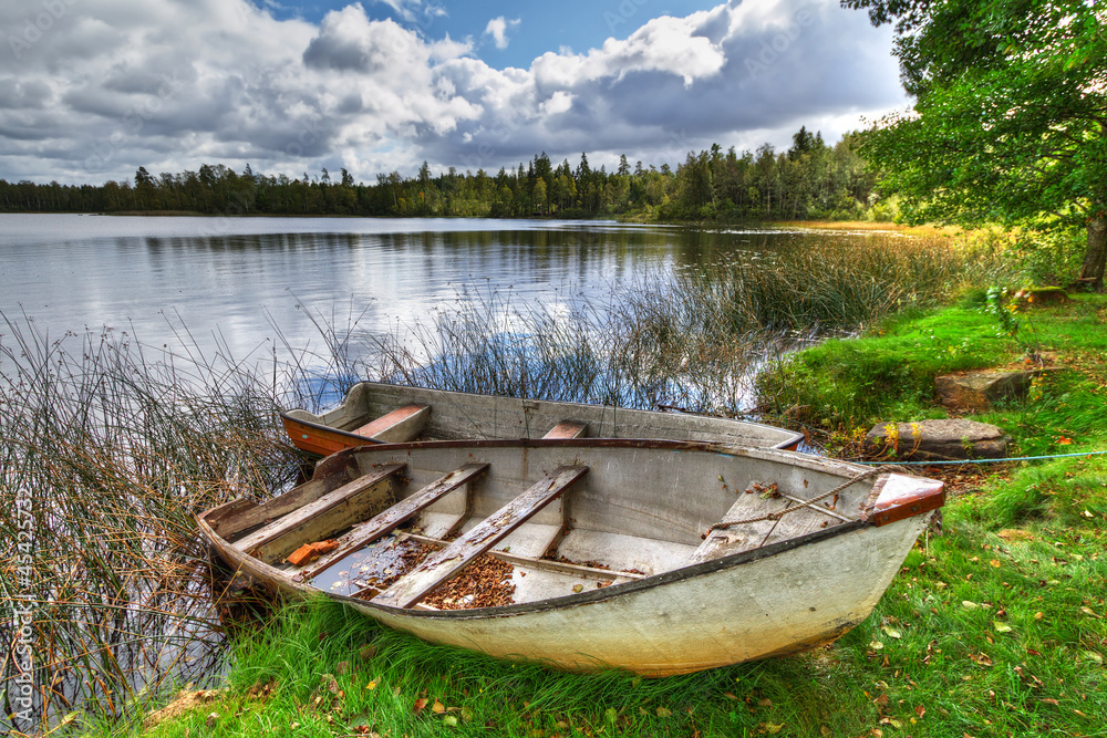 Swedish lake with boat in summer time