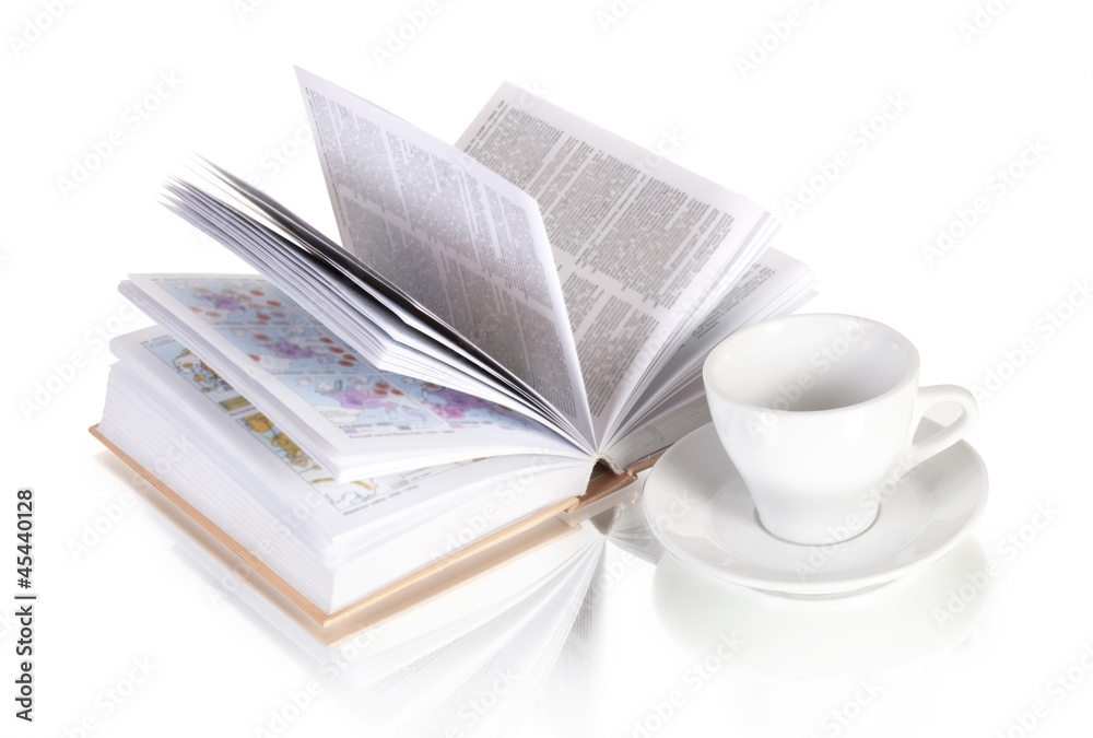 White cup of coffee and open book isolated on white background