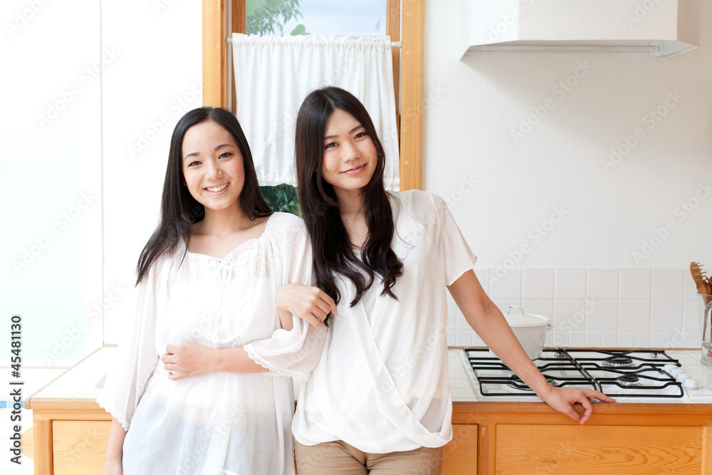 a young asian women in kitchen