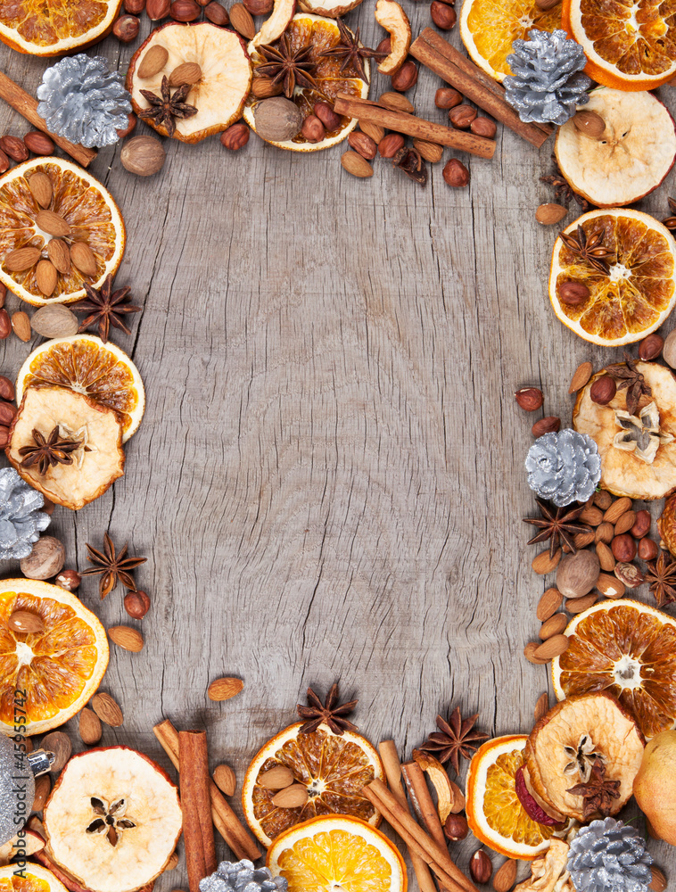 Christmas spices with dry orange and apple slices 