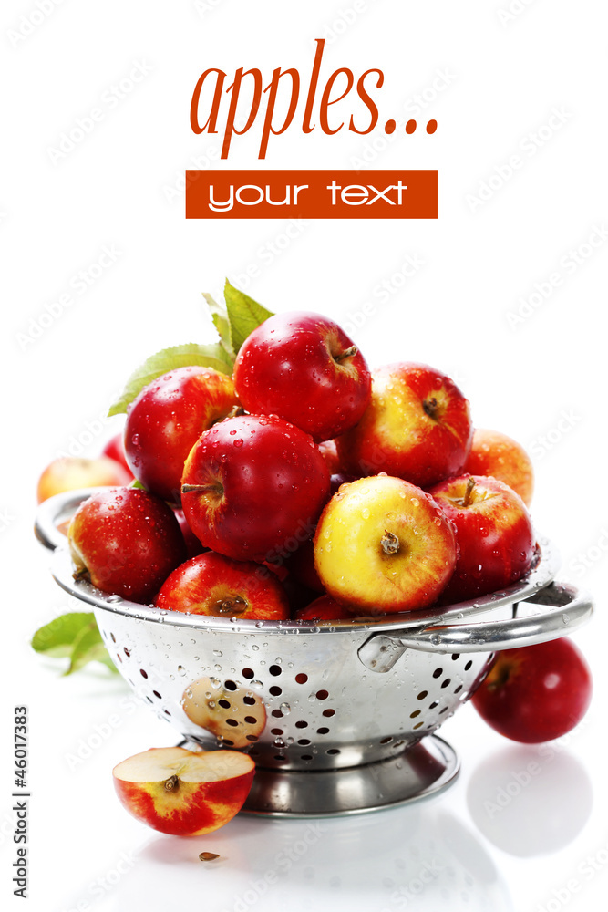 Fresh red apples in metal colander