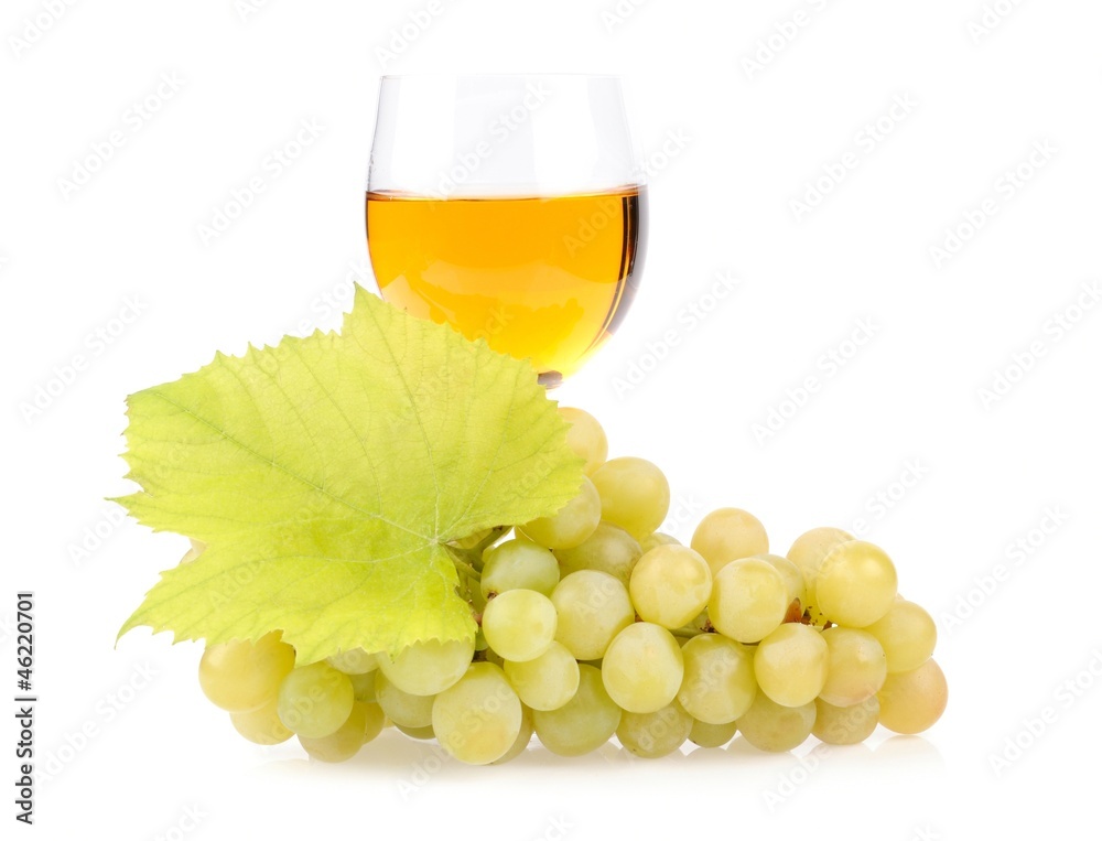 Branch of grapes and glass of wine