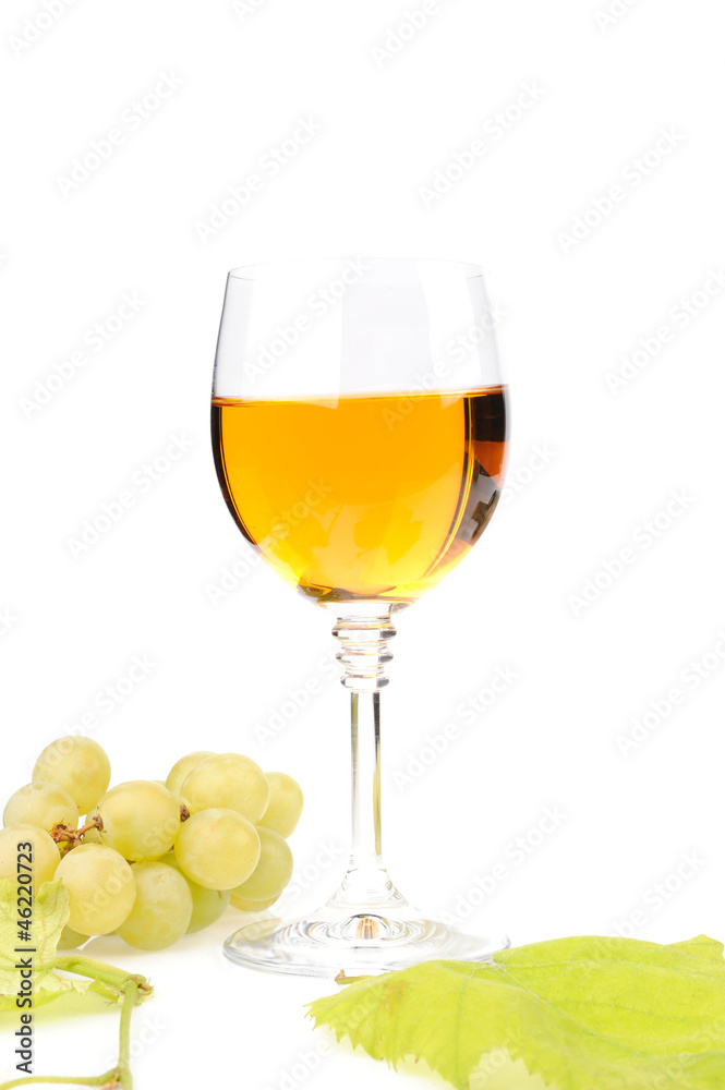 Branch of grapes and glass of wine