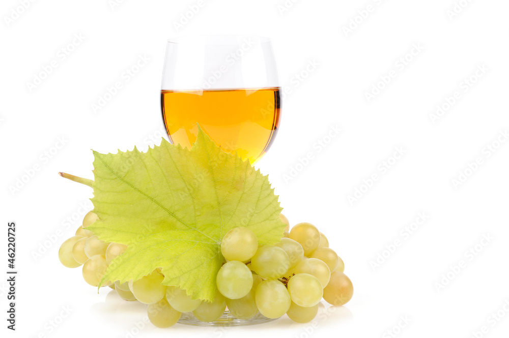 Branch of grapes and glass of wine