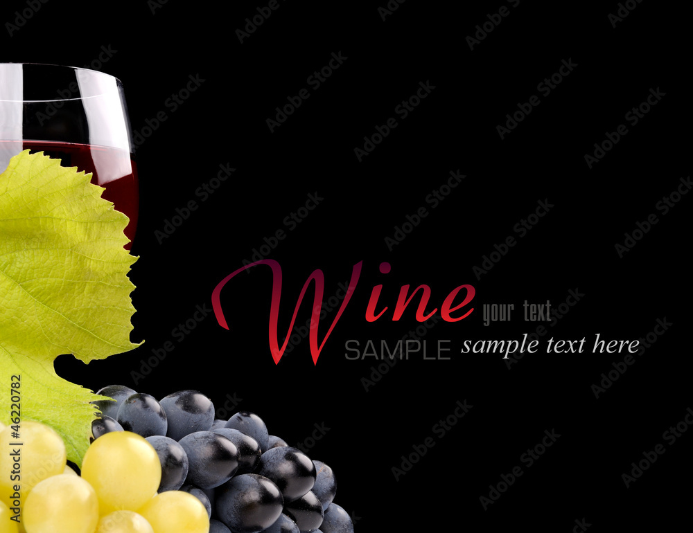 Branch of grapes and glass of wine