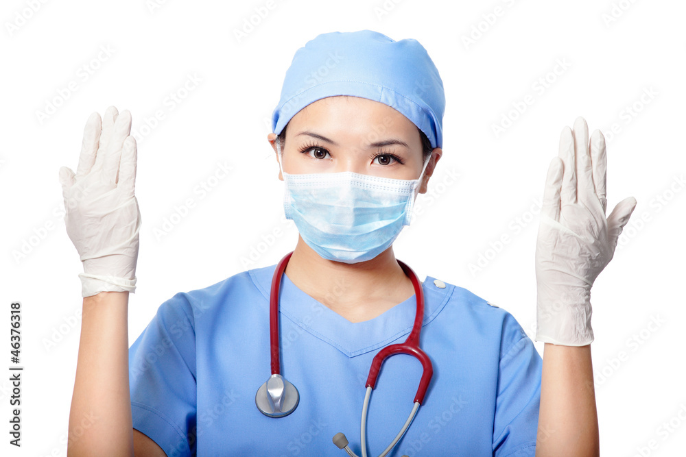 Woman doctor wearing medical gloves