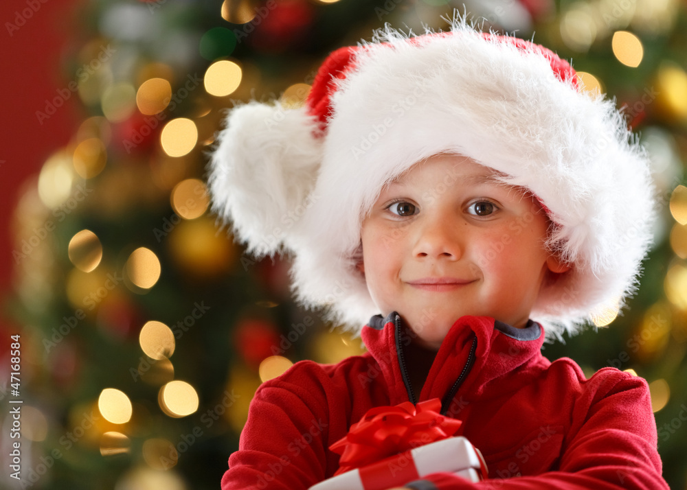 Happy boy with Christmas gift