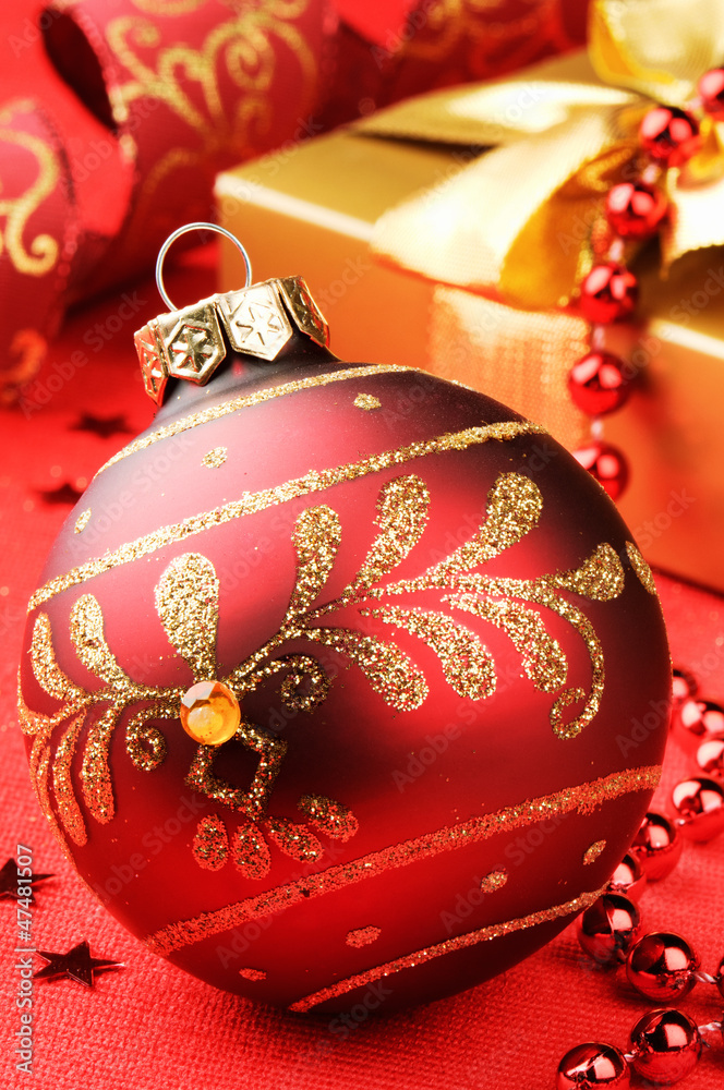 Christmas ball on festive background