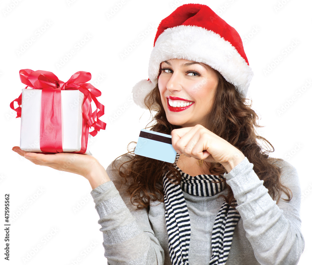 Christmas. Happy Smiling Woman with Gift Box and Credit Card