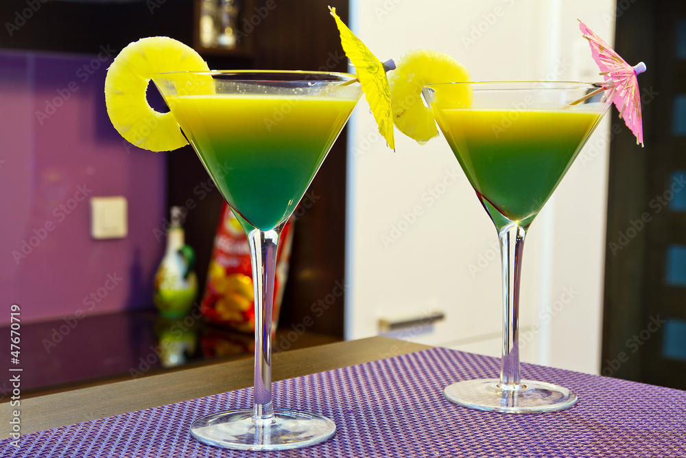 Exotic cocktails in martini glasses