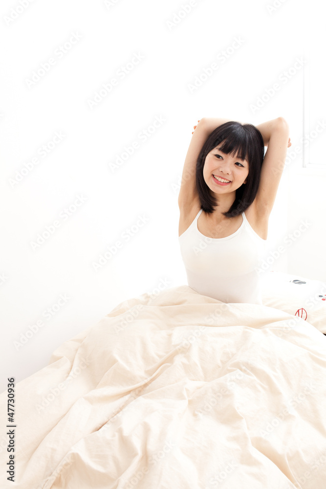 attractive asian woman in the bed