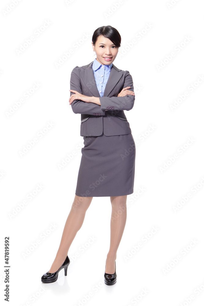 Smiling business woman cross her arms