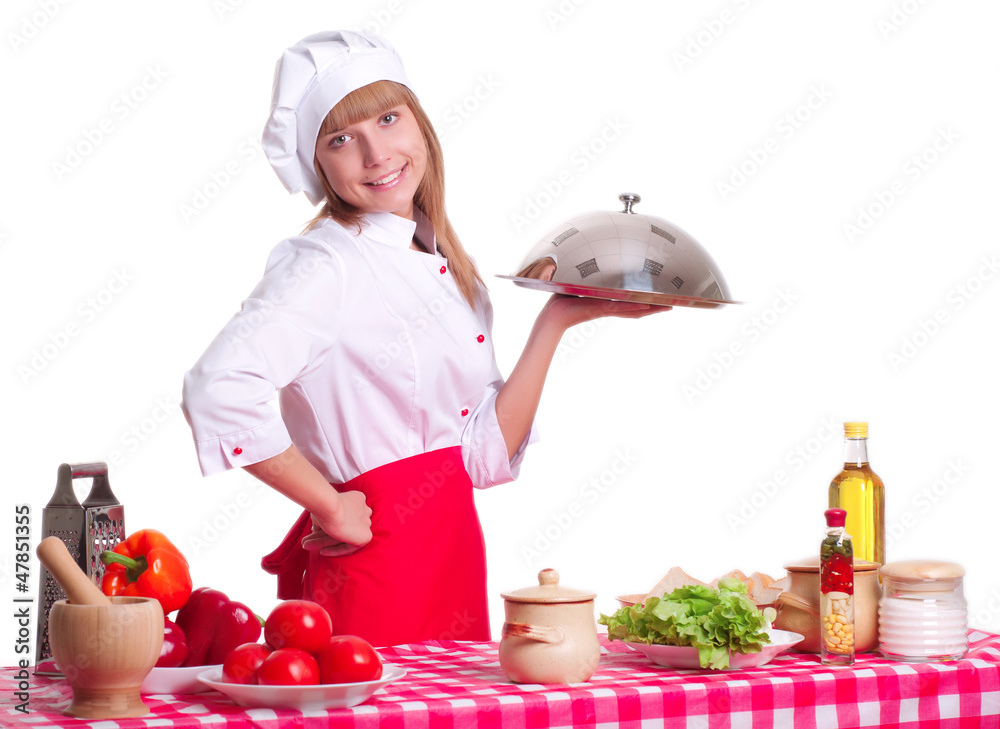 female chef holding a dish