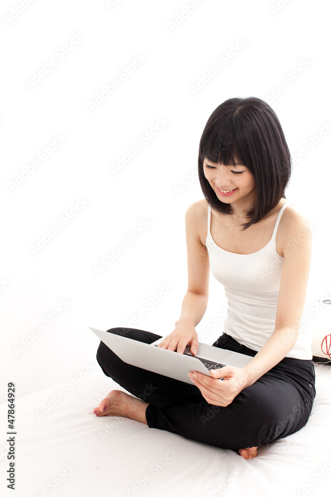 attractive asian woman using laptop computer