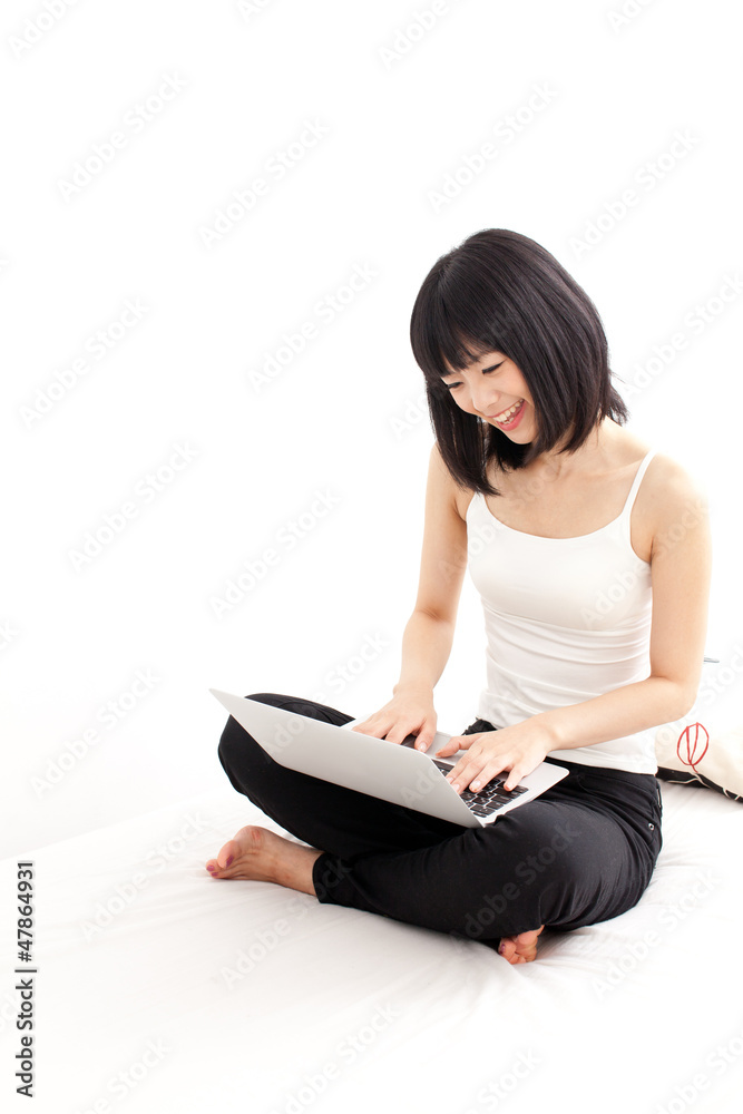 attractive asian woman using laptop computer