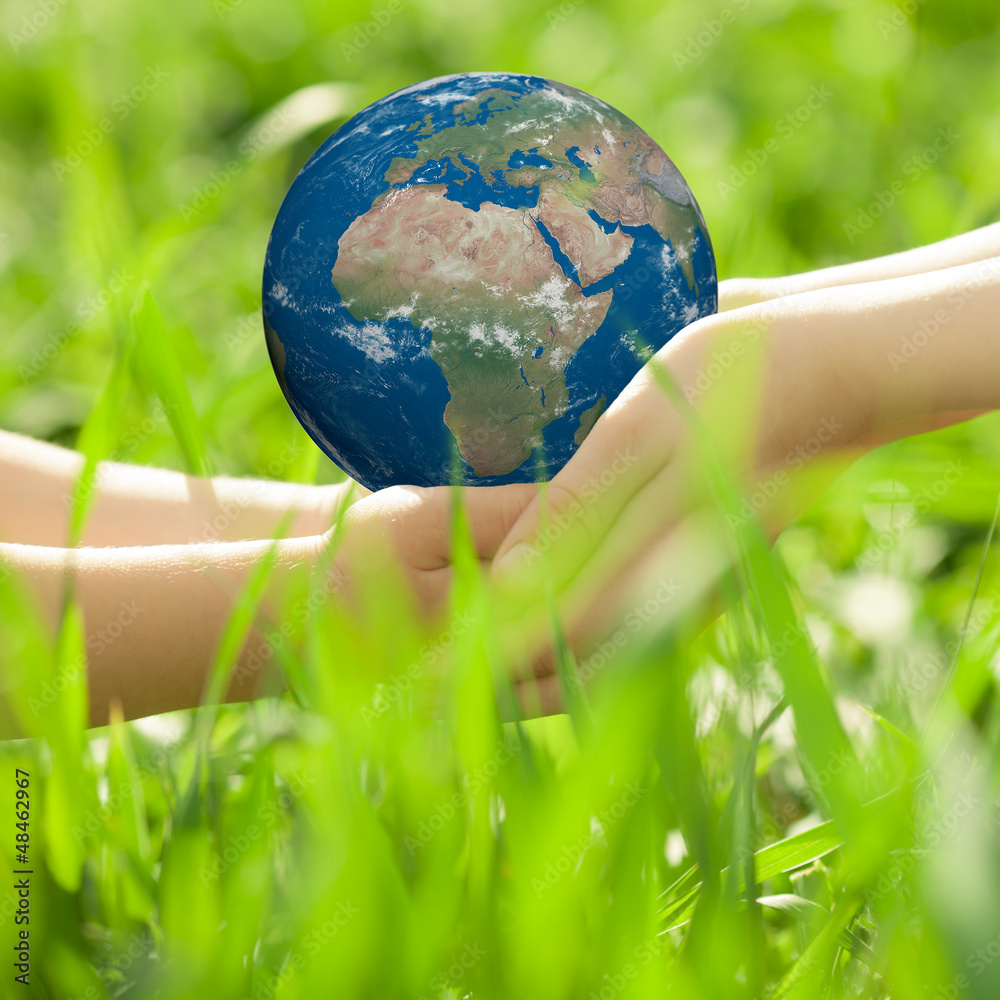 Earth in children`s hands