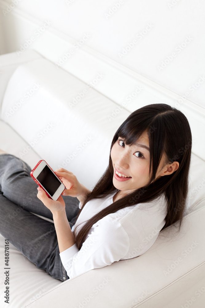 attractive asian woman using smart phone