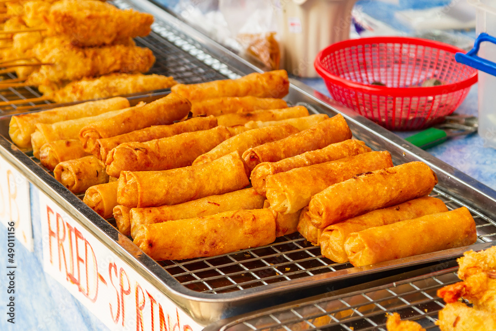 Deep fried spring rolls on the local market in Thailand