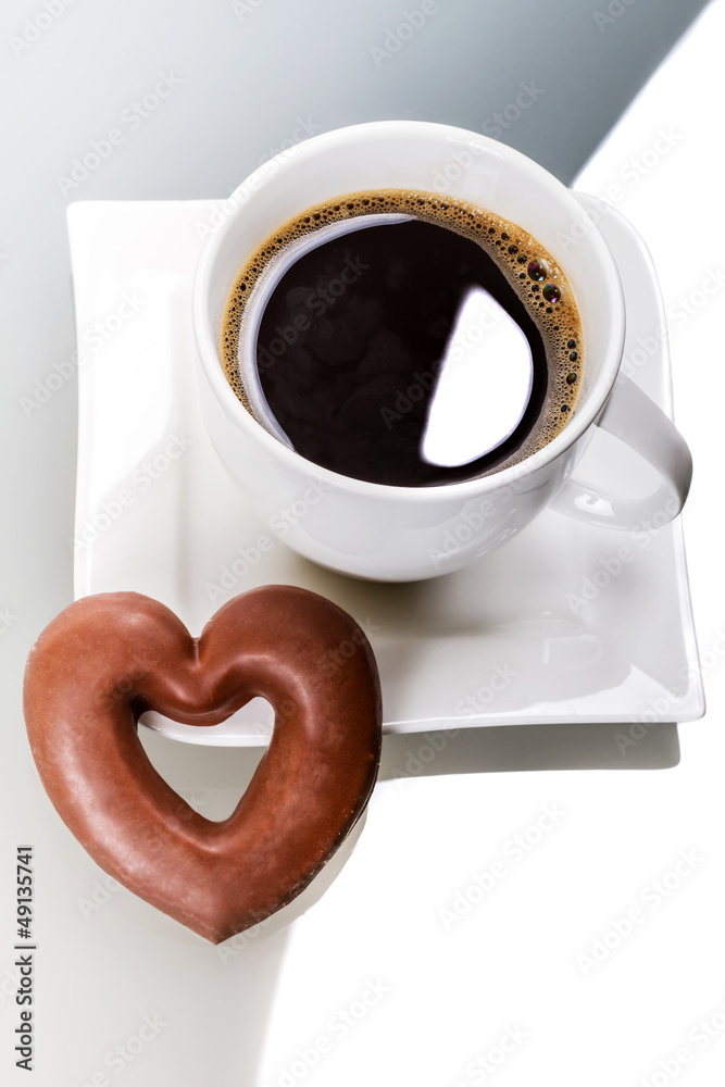 Gingerbread heart with coffee as a love symbol